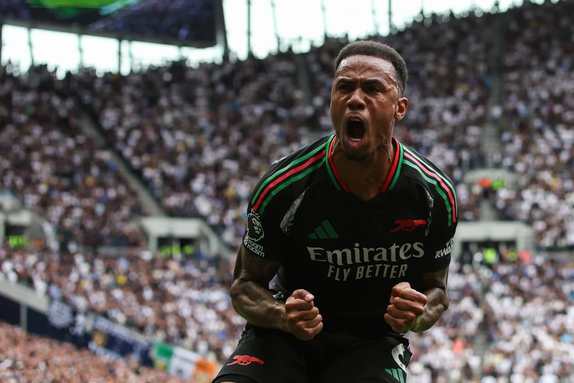 Gabriel Magalhaes of Arsenal celebrates with team mates after scoring the opening goal during the Premier League match Tottenham Hotspur and Arsenal at Tottenham Hotspur Stadium (Credit: Craig Mercer/ Alamy Live News)