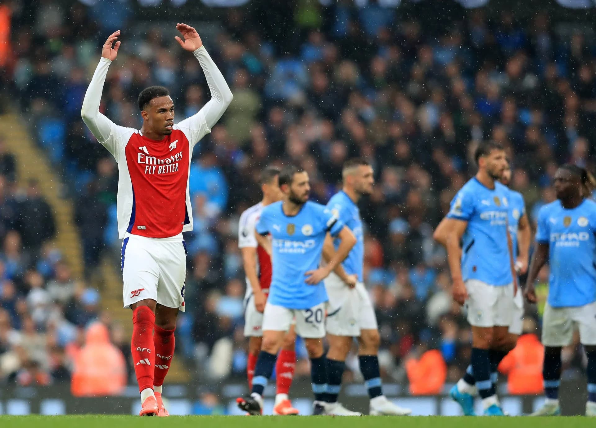 Etihad Stadium, Manchester, UK. 22nd Sep, 2024. Premier League Football, Manchester City versus Arsenal; Gabriel of Arsenal celebrates in front of the visiting fan after scoring with a header from a corner kick for 1-2 in added time during the first half 