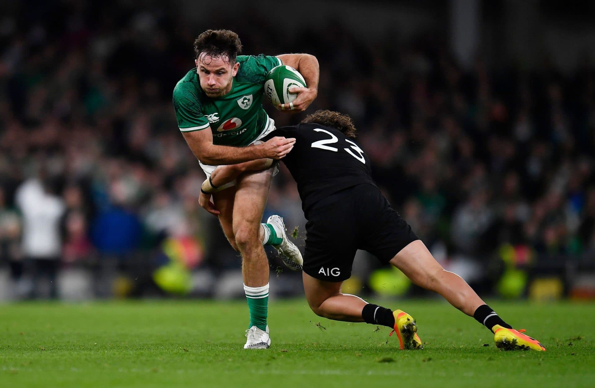 Hugo Keenan in action with New Zealand's David Havili