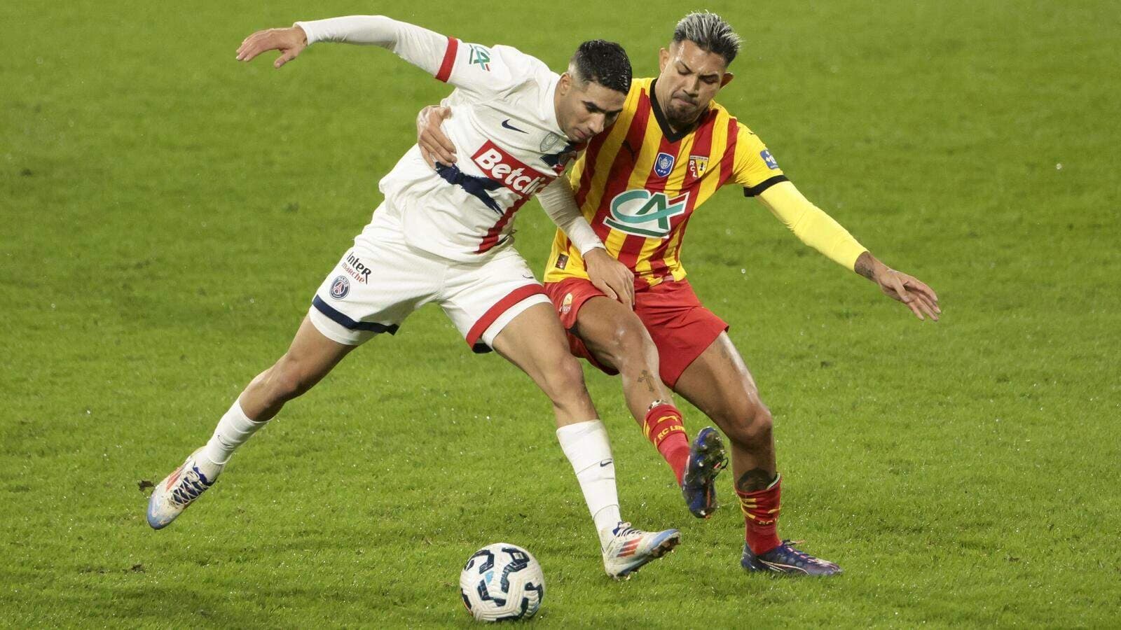 Achraf Hakimi of PSG, Facundo Medina of Lens during the French Cup football match