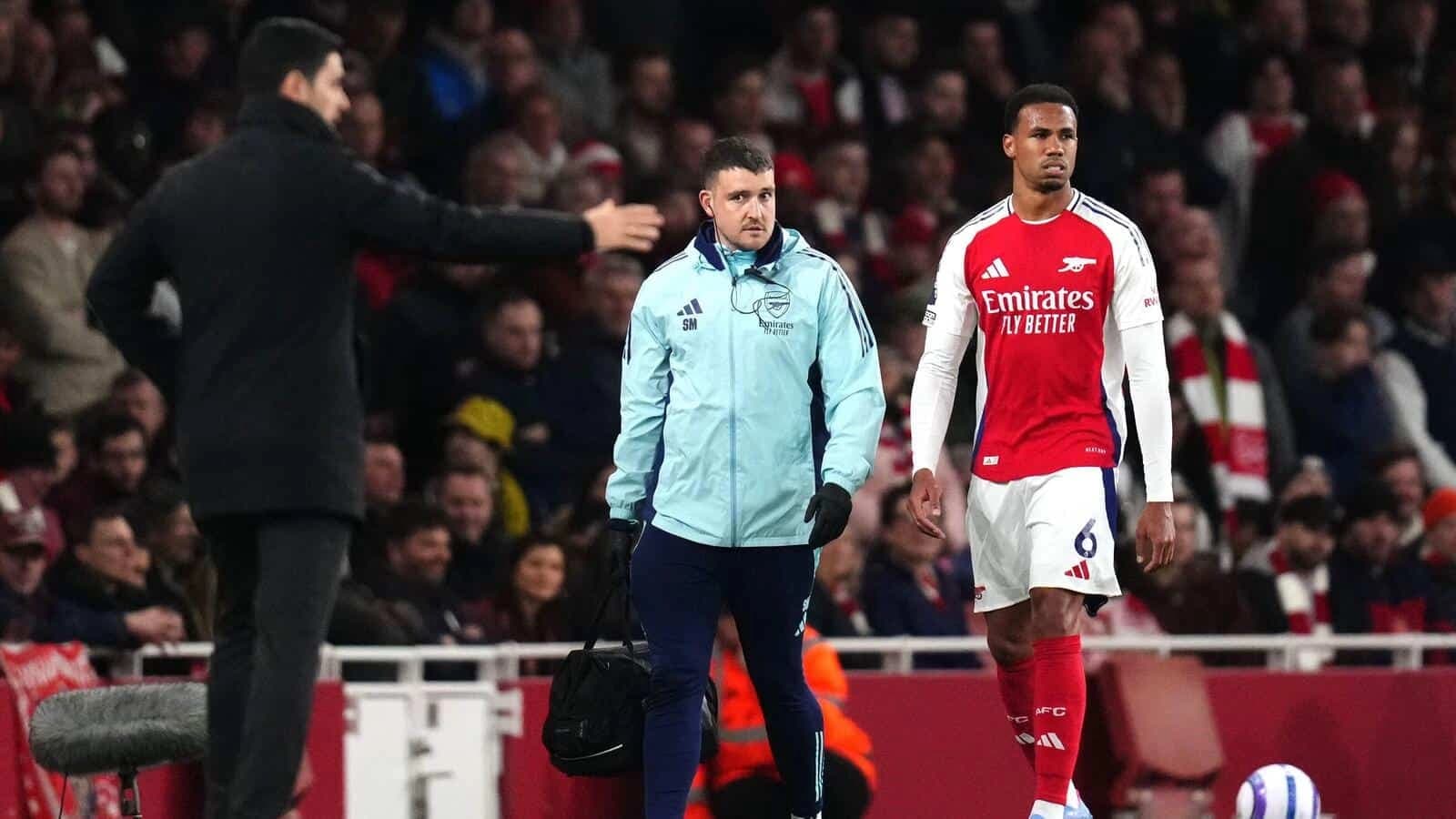 Arsenal's Gabriel (right) leaves the pitch after picking up an injury during the Premier League match