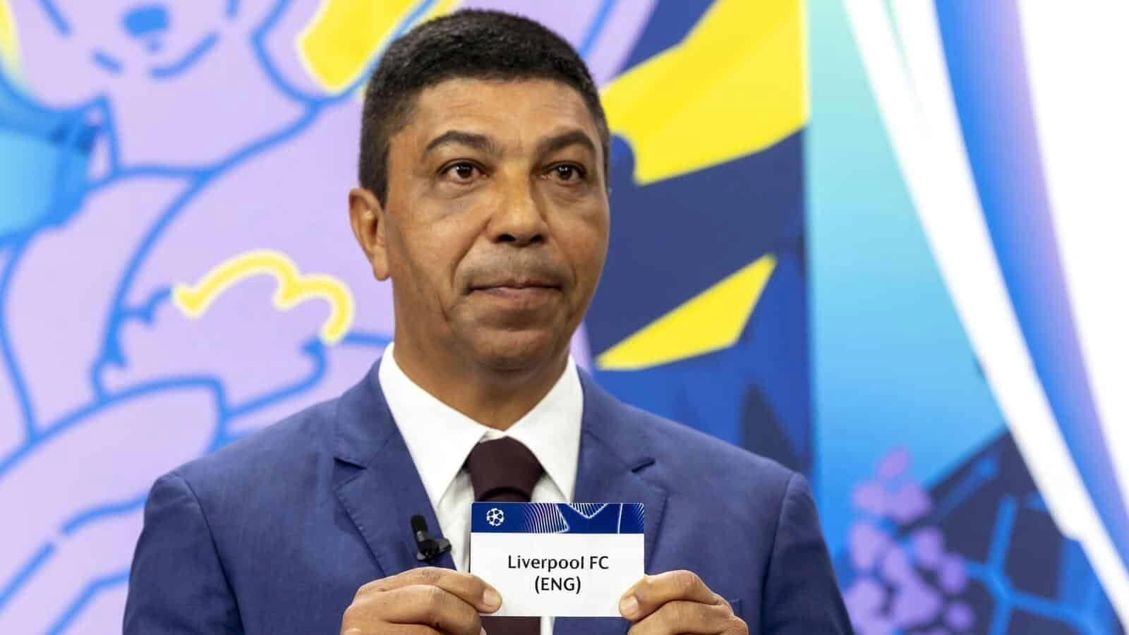 Brazilian former player Giovane Elber shows the ticket of English club Liverpool, during the UEFA Champions League round of 16