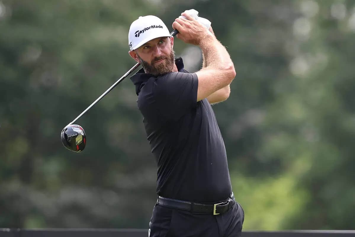 Dustin Johnson plays his shot from the third tee during the second round of the LIV Golf Bedminster golf tournament at Trump National Bedminster