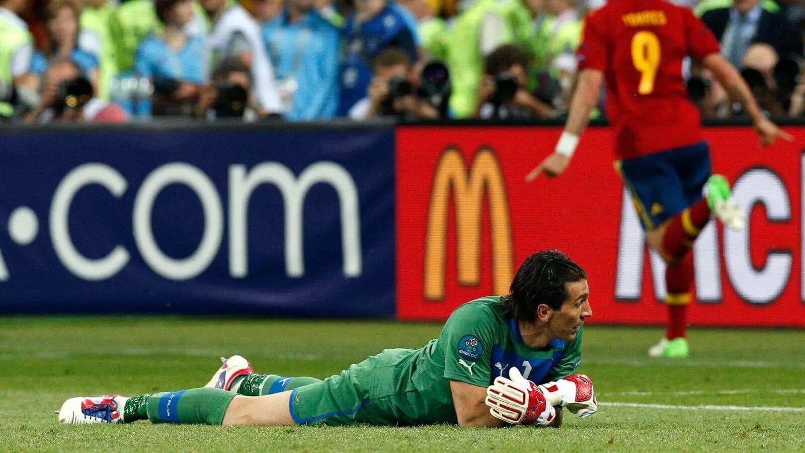 Italy goalkeeper Gianluigi Buffon reacts after Spain's Fernando Torres scored his sides 3rd goal