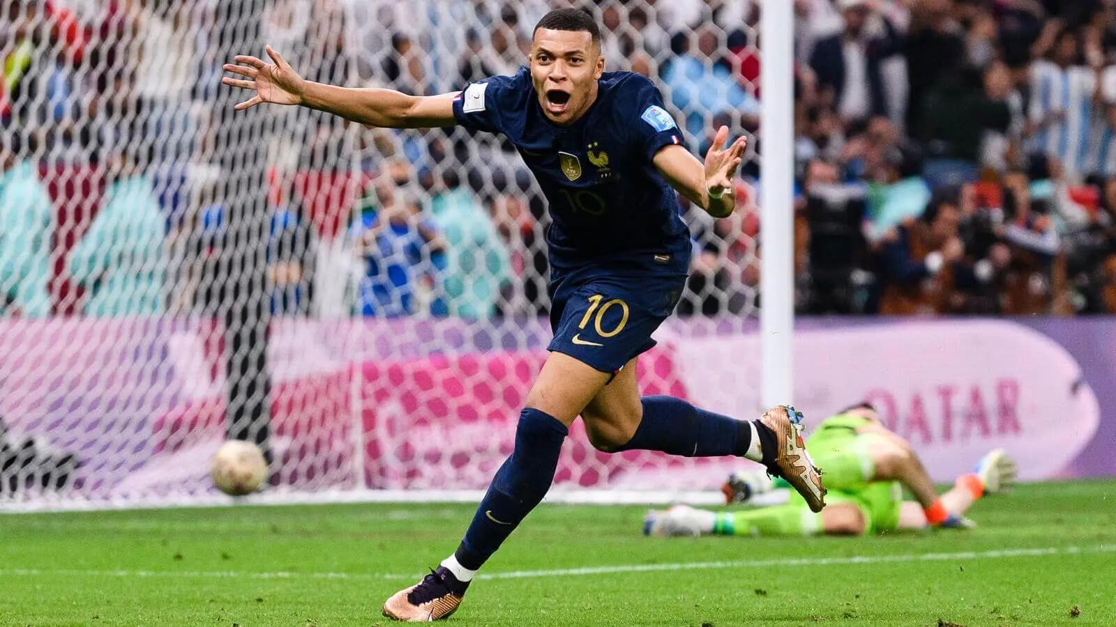 Kylian Mbappe of France celebrates after scoring a goal