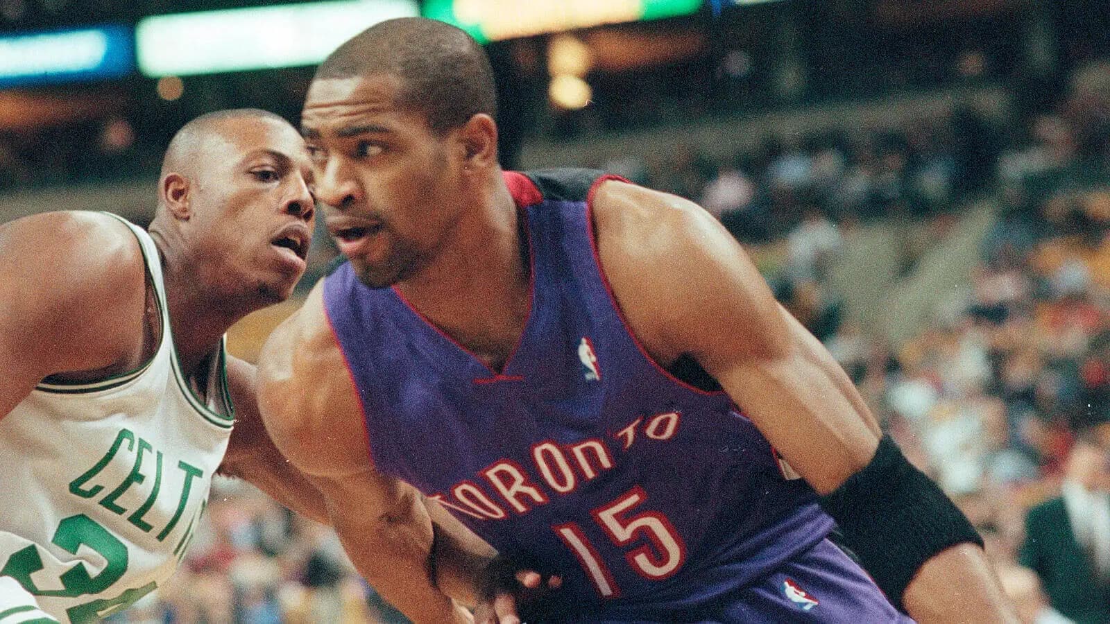 Toronto Raptors #15 Vince Carter (right) and Boston Celtics Paul Pierce (left) in basketball game action